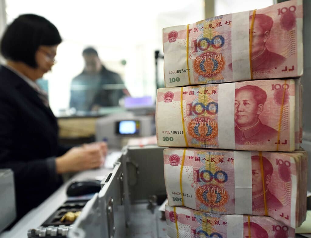 Yuan Slips In opposition to Buck as Traders Watch for China’s November Production Knowledge